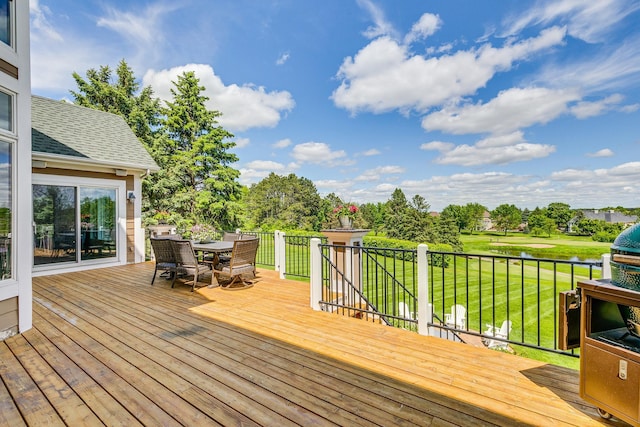3877 Fairway Dr, Woodbury, MN 55125 - wooden terrace with outdoor dining area and a lawn