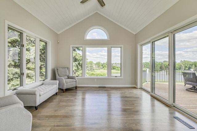 3877 Fairway Dr, Woodbury, MN 55125 - unfurnished room with lofted ceiling, wood finished floors, and a ceiling fan