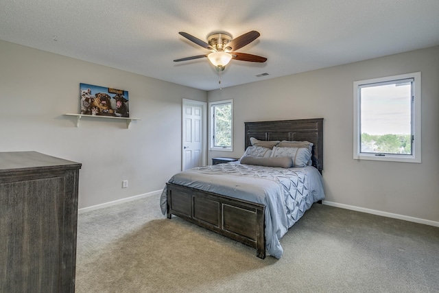 3877 Fairway Dr, Woodbury, MN 55125 - carpeted bedroom with baseboards and a ceiling fan