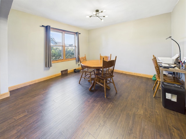 302 2nd St S, Melrose, MN 56352 - dining room with a chandelier, dark wood finished floors, and baseboards