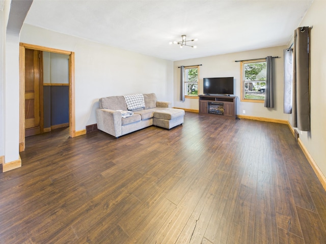 302 2nd St S, Melrose, MN 56352 - living room with dark wood-type flooring and baseboards