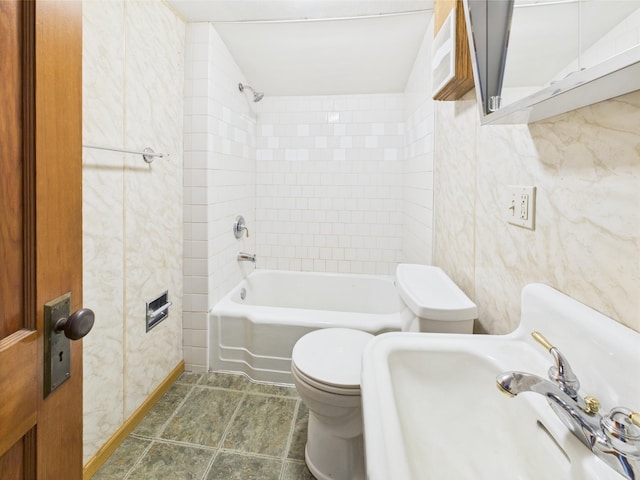 302 2nd St S, Melrose, MN 56352 - bathroom featuring toilet, shower / bathtub combination, baseboards, and a sink