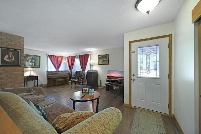 2221 Texas Ave S, Saint Louis Park, MN 55426 - living room featuring wood finished floors, baseboards, and a textured ceiling