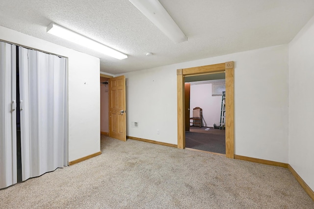 2221 Texas Ave S, Saint Louis Park, MN 55426 - unfurnished bedroom featuring carpet flooring, baseboards, and a textured ceiling