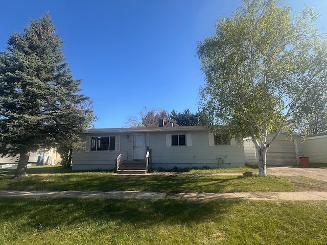 28 Cypress Blvd, Babbitt, MN 55706 - single story home featuring driveway, a front yard, and a garage