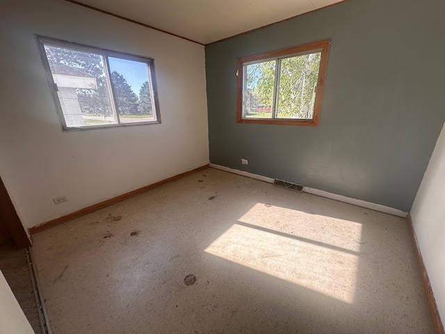 28 Cypress Blvd, Babbitt, MN 55706 - empty room with baseboards and crown molding