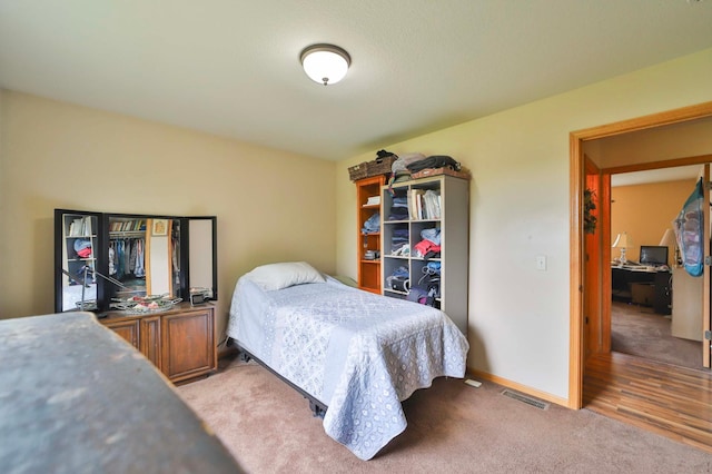 9095 Twins St, Brainerd, MN 56401 - bedroom with light carpet and baseboards
