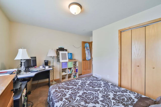 9095 Twins St, Brainerd, MN 56401 - bedroom with carpet, a closet, an office area, and baseboards
