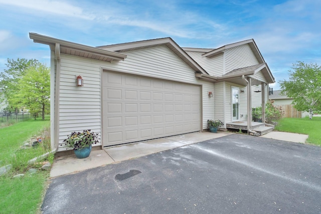 9095 Twins St, Brainerd, MN 56401 - view of front facade with driveway and an attached garage
