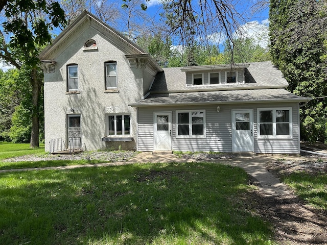 6950 270th St, New Prague, MN 56071 - view of front facade featuring a front yard and roof with shingles