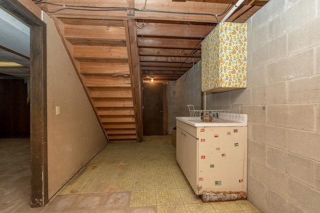 6950 270th St, New Prague, MN 56071 - below grade area featuring light floors and concrete block wall