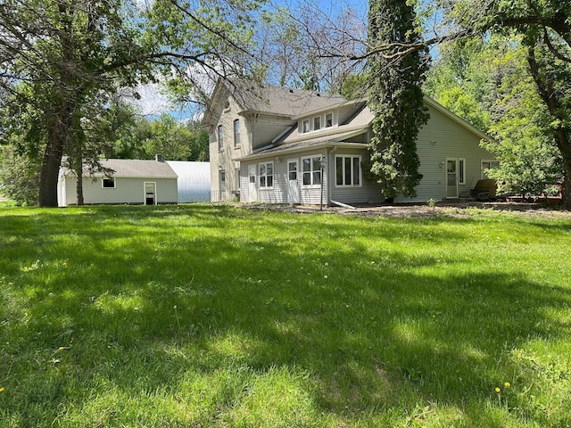 6950 270th St, New Prague, MN 56071 - rear view of house featuring a yard