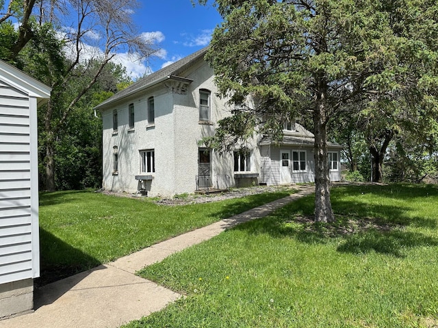 6950 270th St, New Prague, MN 56071 - view of home's exterior featuring a yard