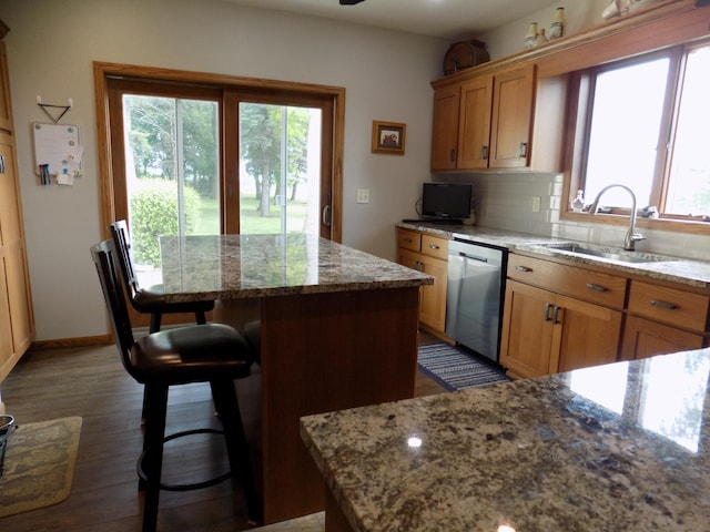 534 200th St, Cedar Twp, MN 56176 - kitchen featuring dishwasher, plenty of natural light, a sink, and a kitchen island