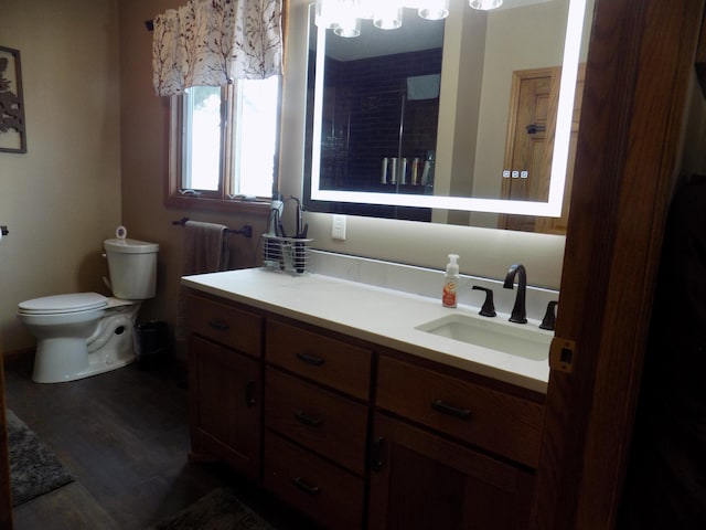 534 200th St, Cedar Twp, MN 56176 - bathroom featuring toilet, vanity, and a shower
