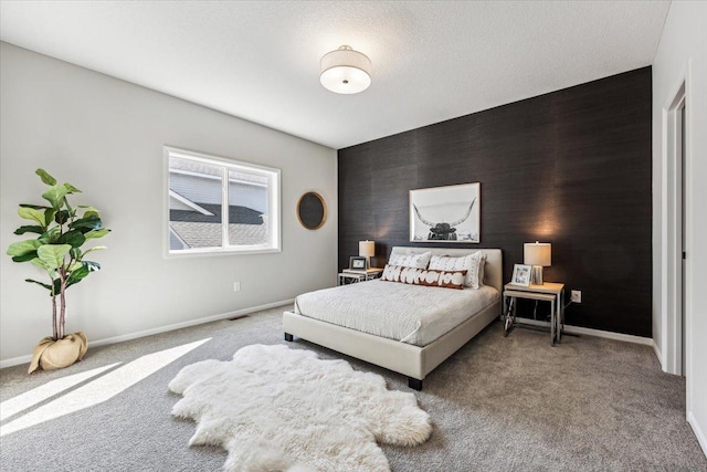 2701 213th St W, Farmington, MN 55024 - bedroom with an accent wall, carpet, and baseboards