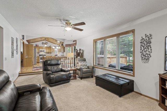 15144 Zilla St NW, Andover, MN 55304 - living room with light colored carpet, a ceiling fan, a textured ceiling, and baseboards