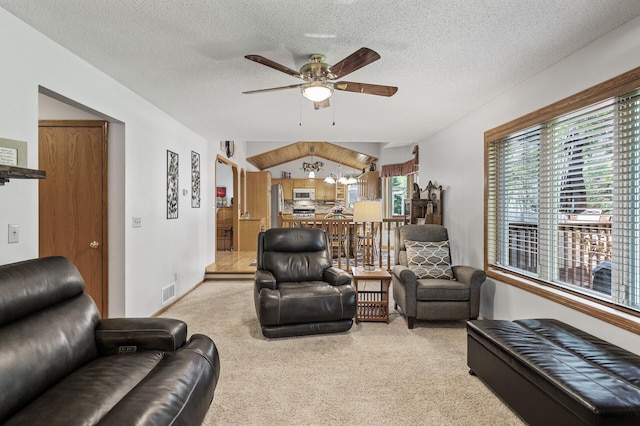 15144 Zilla St NW, Andover, MN 55304 - living area with a ceiling fan, carpet flooring, and a textured ceiling