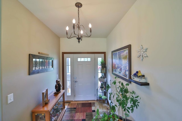 23369 330th St, Sebeka, MN 56477 - entrance foyer featuring a chandelier and wood finished floors