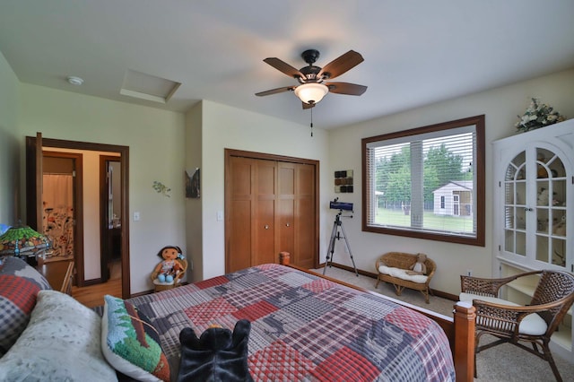 23369 330th St, Sebeka, MN 56477 - bedroom featuring a closet, attic access, baseboards, and ceiling fan