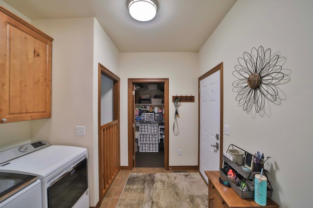 23369 330th St, Sebeka, MN 56477 - laundry area with washer and clothes dryer and cabinet space
