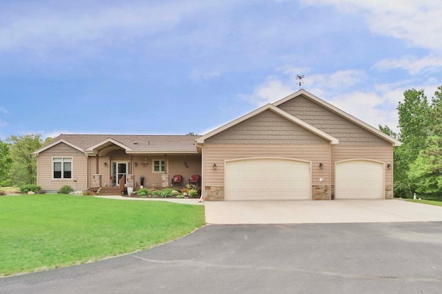 23369 330th St, Sebeka, MN 56477 - single story home with driveway, a garage, a front yard, stone siding, and covered porch