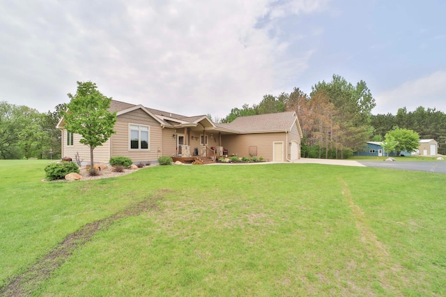 23369 330th St, Sebeka, MN 56477 - single story home with a porch, driveway, a front yard, and an attached garage