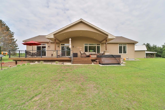 23369 330th St, Sebeka, MN 56477 - back of house with a hot tub, a yard, a deck, and a shingled roof