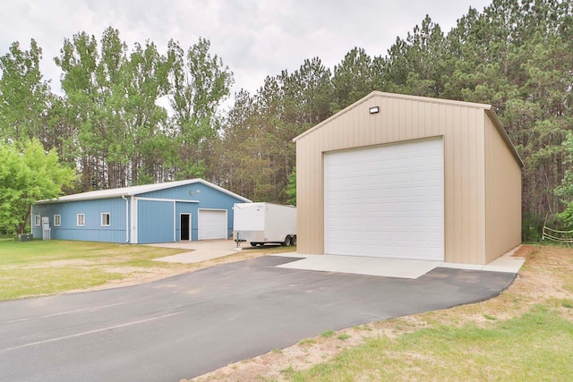 23369 330th St, Sebeka, MN 56477 - detached garage featuring view of scattered trees
