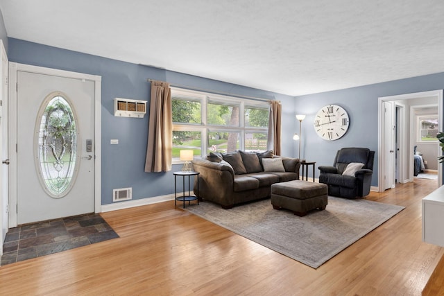 3732 Jersey Ave N, Crystal, MN 55427 - living room featuring plenty of natural light and wood finished floors