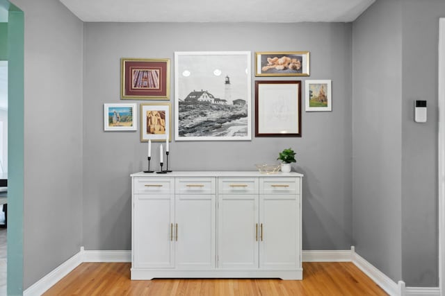 3732 Jersey Ave N, Crystal, MN 55427 - detailed view of wood finished floors and baseboards