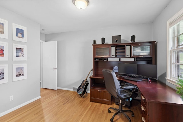 3732 Jersey Ave N, Crystal, MN 55427 - office area with light wood-style floors and baseboards