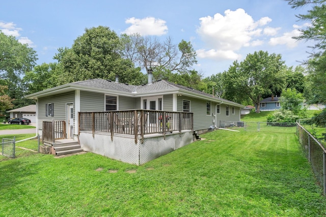 3732 Jersey Ave N, Crystal, MN 55427 - back of house with a fenced backyard, a wooden deck, and a garage