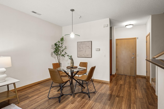 2566 Ellis Ave Unit 124, Saint Paul, MN 55114 - dining space featuring wood finished floors and baseboards