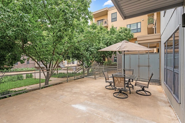 2566 Ellis Ave Unit 124, Saint Paul, MN 55114 - view of patio with outdoor dining space