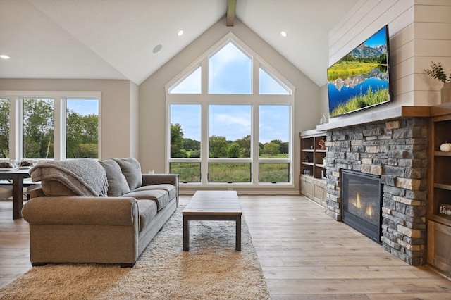 18022 Urbank St NE, Ham Lake, MN 55304 - living room featuring wood finished floors, a fireplace, and recessed lighting