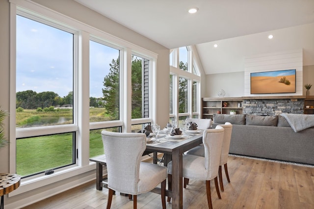 18022 Urbank St NE, Ham Lake, MN 55304 - dining area featuring light wood-style floors, vaulted ceiling, and recessed lighting