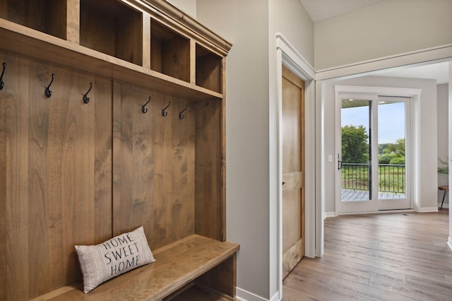 18022 Urbank St NE, Ham Lake, MN 55304 - mudroom with light wood-type flooring and baseboards