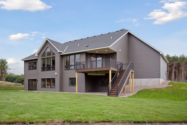 18022 Urbank St NE, Ham Lake, MN 55304 - rear view of property with a deck, stairway, a yard, and a shingled roof