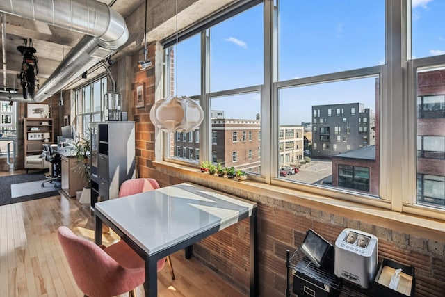 901 3rd St Unit 411, Minneapolis, MN 55401 - dining space featuring a desk, hardwood / wood-style floors, and a view of city