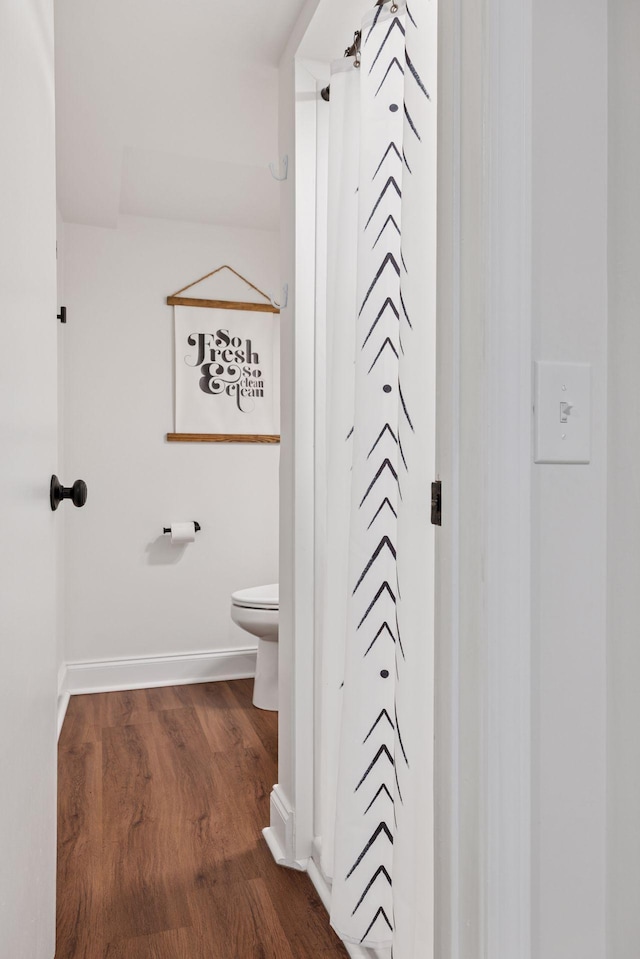 2904 Jersey Ave S, Saint Louis Park, MN 55426 - full bathroom with wood finished floors and a shower with curtain