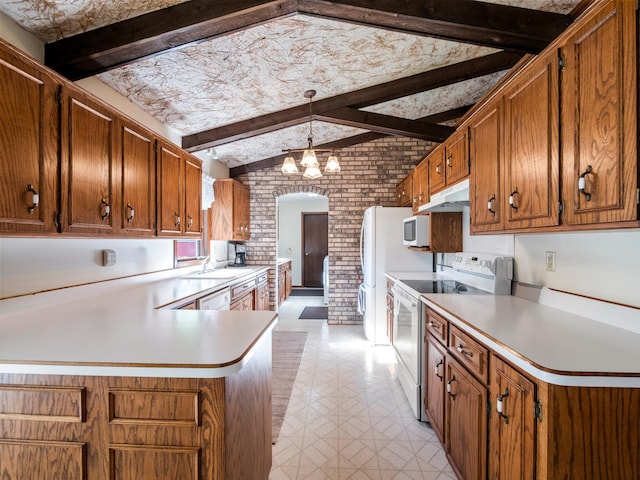 8048 Lake Ida Way NW, Alexandria, MN 56308 - kitchen with white appliances, brick wall, arched walkways, under cabinet range hood, and light countertops