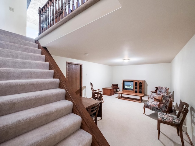 8048 Lake Ida Way NW, Alexandria, MN 56308 - carpeted living area featuring stairway