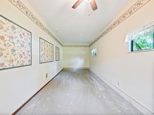 8048 Lake Ida Way NW, Alexandria, MN 56308 - carpeted empty room with plenty of natural light, ceiling fan, and baseboards