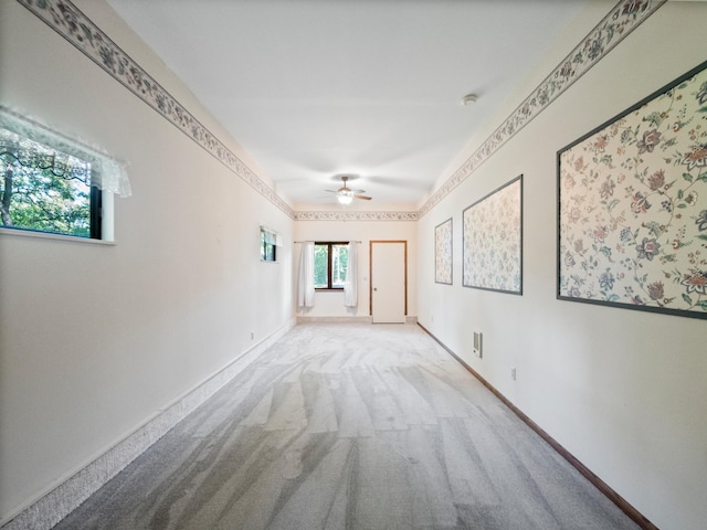 8048 Lake Ida Way NW, Alexandria, MN 56308 - carpeted empty room with a ceiling fan, baseboards, and a smoke detector