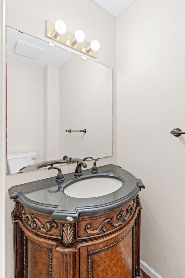 7719 Nicholas Way, Chanhassen, MN 55317 - half bathroom featuring vanity