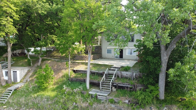 23759 Clarissa Haven Dr, Girard Twp, MN 56551 - view of yard with stairway and a patio