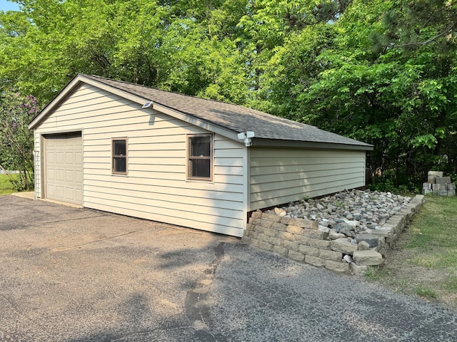 23759 Clarissa Haven Dr, Girard Twp, MN 56551 - detached garage with asphalt driveway