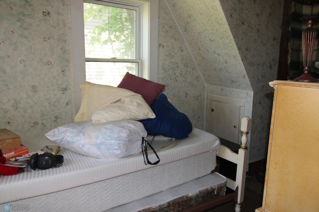 133 Welch St, Perley, MN 56574 - bedroom with wallpapered walls and vaulted ceiling
