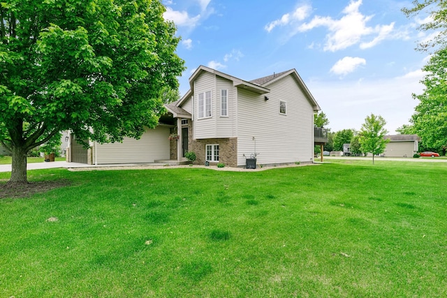 1600 Buffalo Cv, Buffalo, MN 55313 - view of side of home featuring a lawn and an attached garage